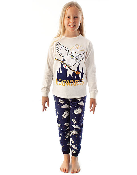 Our Harry Potter PJ set for kids is the perfect gift for all little fans of the classic J. K. Rowling novels and the Warner Bros movies. This Harry Potter nightwear set for her includes a long sleeve cream t-shirt and navy cuffed pyjama bottoms perfect for those magical Harry Potter dreams.