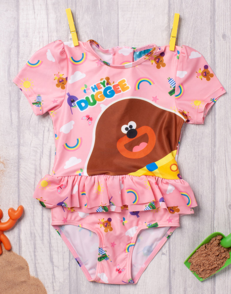 HEY DUGGEE PINK CHARACTER SUNSAFE SWIMSUIT - Our adorable girl’s Hey Duggee swimsuit is perfect for little ones on their summer adventures, swimming and playing on pool and beach days with the Squirrel Club whilst keeping safe from the sun!