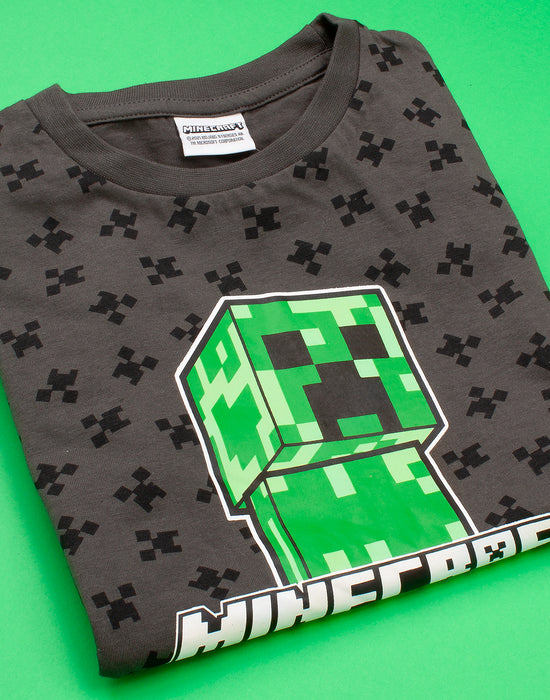 MINECRAFT CREEPER T SHIRT FOR CHILDREN & TEEN GAMERS - This awesome Minecraft t-shirt comes with shorts sleeves and a crew neck featuring the popular Mojang video games villain, the Creeper making a must have gift for gamers!