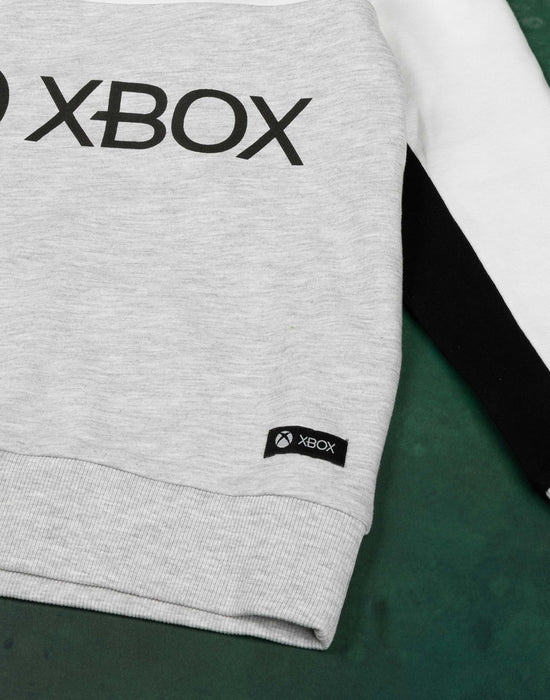 Grey and white hoodie with long sleeves and a crewneck features the popular video game console logo and official woven tag making an awesome outfit for all special occasions and game nights!